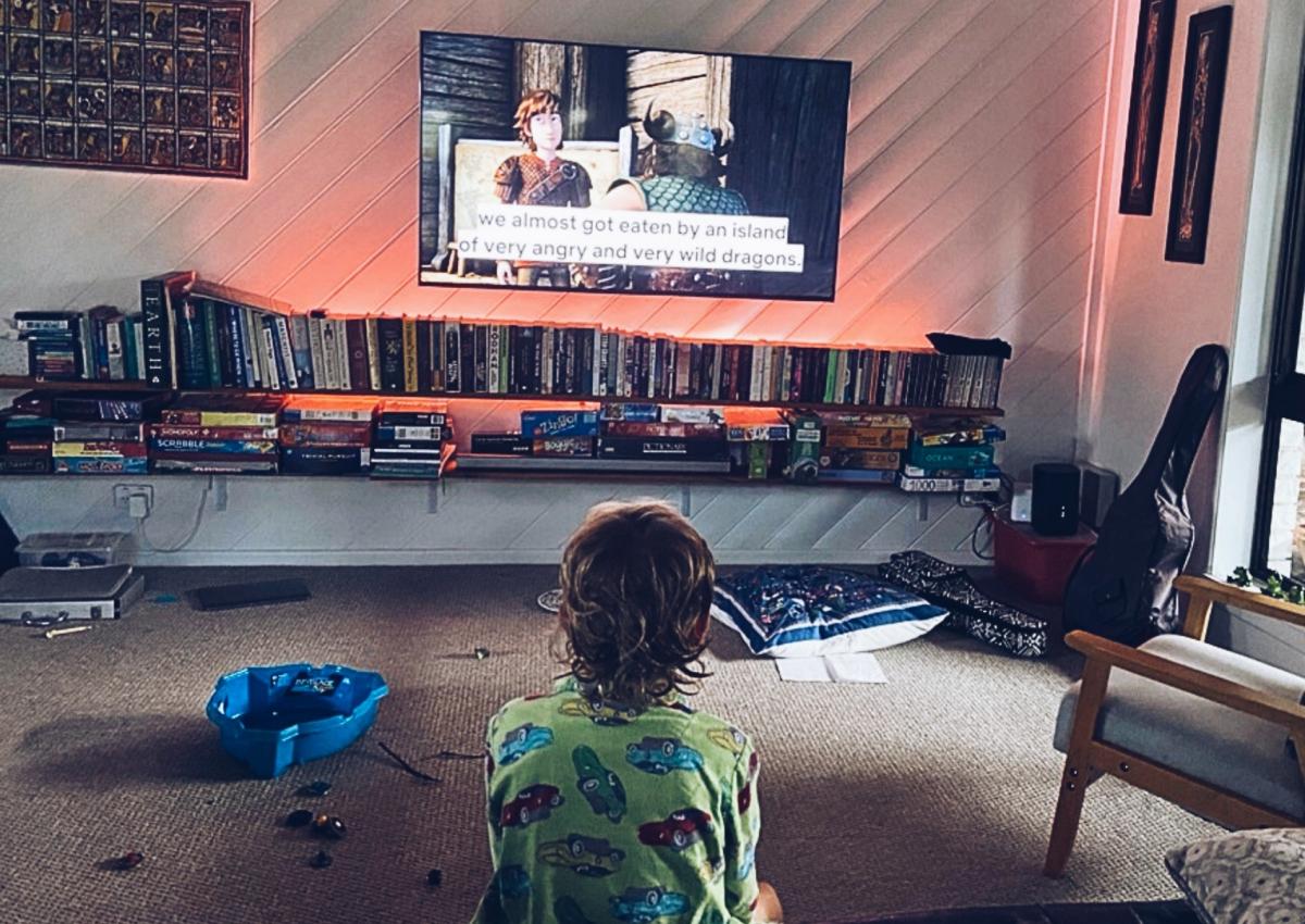 Boy watching tv | Accessibility | Digital NSW