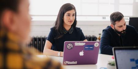 Woman on purple laptop