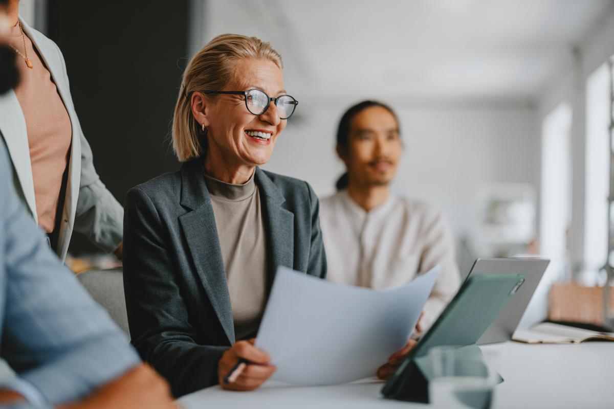 business woman wearing glasses with laptop