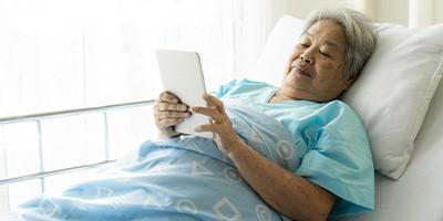 Image of lady in a hospital bed